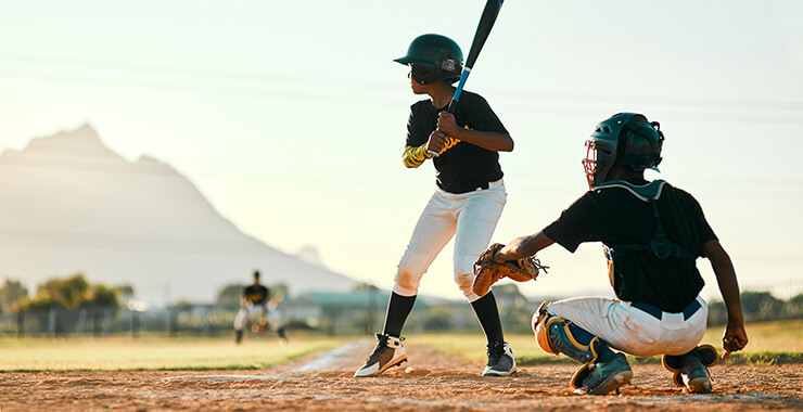 Sports injury prevention. Pre-teens playing baseball