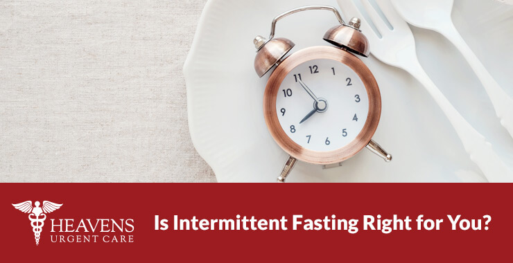 Analog alarm clock on a plat with fork - Is intermittent fasting right for you?